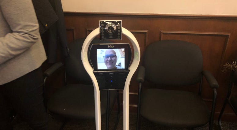 A robot that helps a student with leukemia attend classes. High School Robot Student