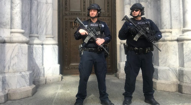 Police watch over St. Patrick's Cathedral. St. Patrick's NYPD police Easter