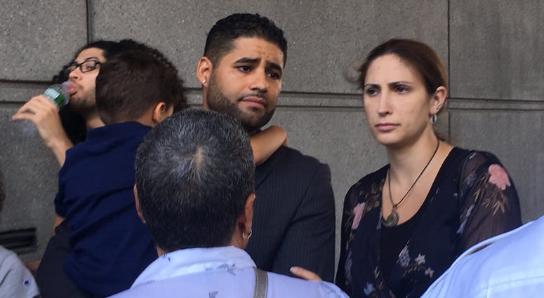Juan Rodriguez and his wife leave court on August 1, 2019. Juan Rodriguez and his wife