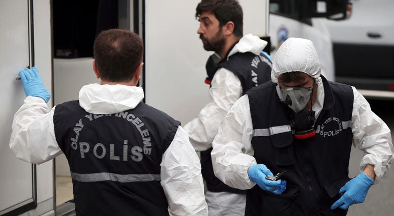 Turkish police officers prepare to enter the residence of the Saudi consul General Mohammed al-Otaibi to conduct a search after the disappearance and alleged slaying of writer Jamal Khashoggi, in Istanbul, Wednesday, Oct. 17, 2018. Khashoggi Investigation