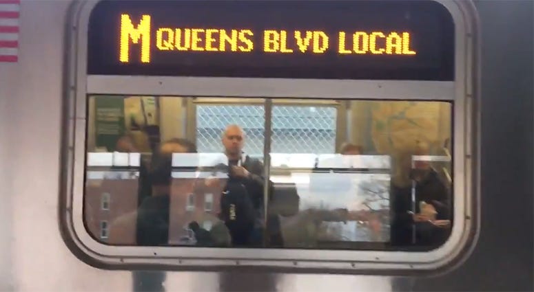 M Subway Train at the Fresh Pond Road station in Queens. M Subway Train