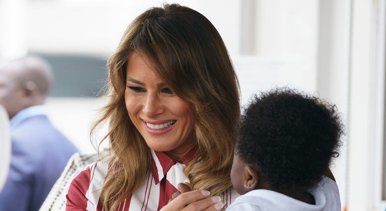 First lady Melania Trump holds a baby as she visits Greater Accra Regional Hospital in Accra, Ghana, Tuesday, Oct. 2, 2018. The first lady is visiting Africa on her first big solo international trip. Melania Trump In Africa