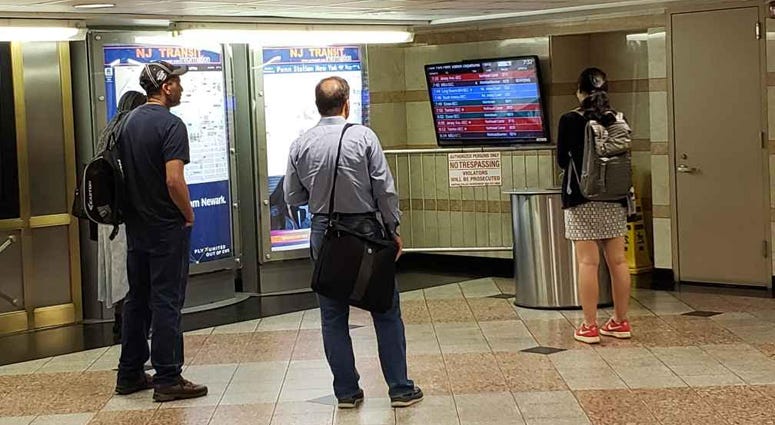 NJ TRANSIT riders at Penn Station NJ TRANSIT