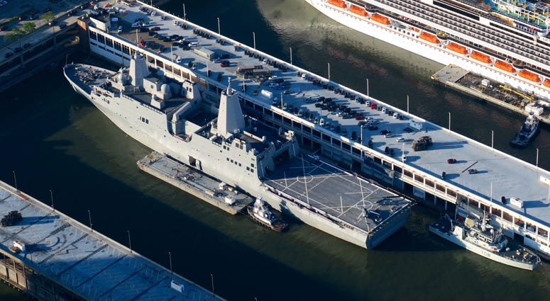 The USS Arlington joins the Intrepid Museum in the Hudson River. Fleet Week 2018