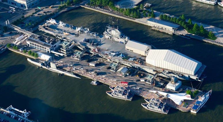 The USS Arlington joins the Intrepid Museum in the Hudson River. Fleet Week 2018