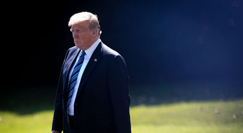 President Donald Trump walks on the South Lawn heading for the Marine One departing from the White House. President Donald Trump
