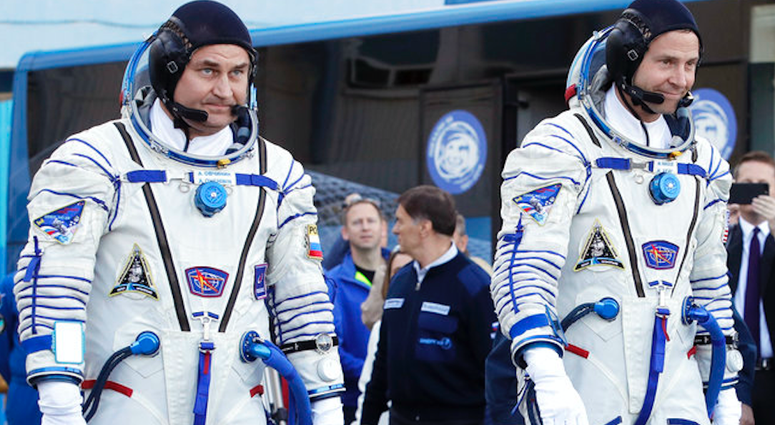 U.S. astronaut Nick Hague, right and Russian cosmonaut Alexey Ovchinin, member of the main crew of the expedition to the International Space Station