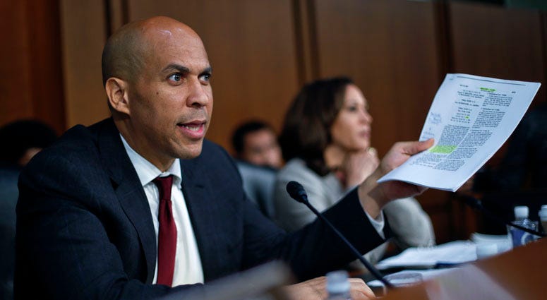 Sen. Cory Booker, D-N.J., questions witnesses before the Senate Judiciary Committee during the final stage of the confirmation hearing for President Donald Trump's Supreme Court nominee, Brett Kavanaugh, on Capitol Hill in Washington, Friday, Sept. 7. Sen. Cory Booker