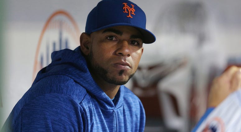 New York Mets injured left fielder Yoenis Cespedes (52) in the dugout during the fourth inning against the Miami Marlins at Citi Field. Yoenis Cespedes