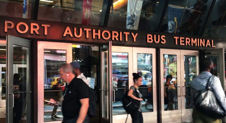 Commuters pass through the entrance of the Port Authority Bus Terminal in Manhattan on Tuesday September 4, 2018. Port Authority Bus Terminal