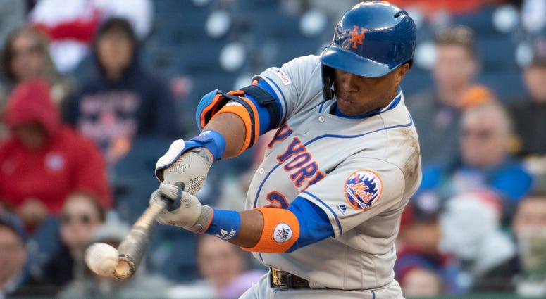 ew York Mets second baseman Robinson Cano (24) singles during the ninth inning against the Washington Nationals at Nationals Park. Robinson Cano
