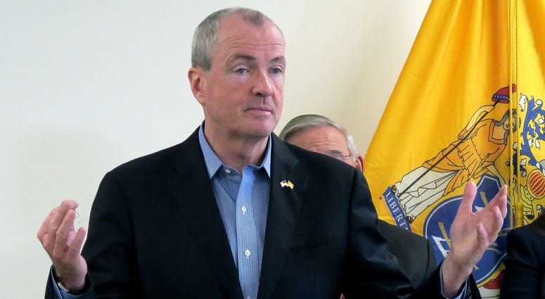 Governor Phil Murphy gestures as he speaks at the Shark River Municipal Marina in the town Monday, April 8, 2019. Phil Murphy