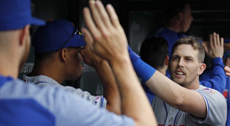 New York Mets second baseman Jeff McNeil (6) celebrates after hitting a two-run home off Chicago Cubs starting pitcher Yu Darvish (11) during the third inning at Wrigley Field. Jeff McNeil