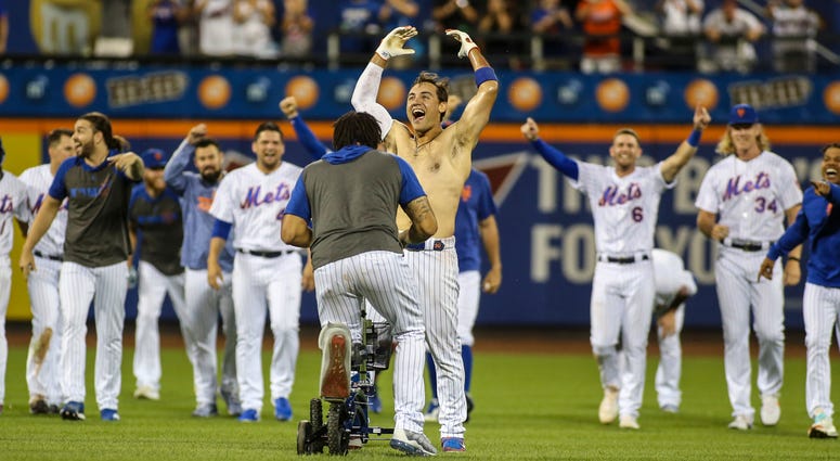 New York Mets center fielder Michael Conforto (30) celebrates after hitting a walk off RBI single to beat the Washington Nationals 7-6 at Citi Field. Mets Nationals