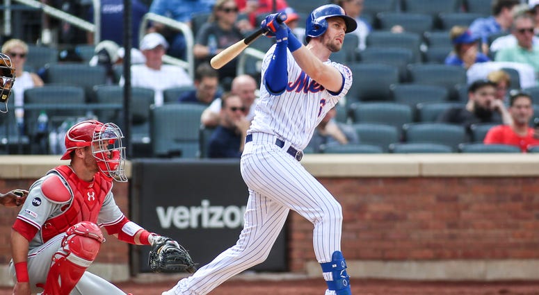 New York Mets third baseman Jeff McNeil (6) hits a single in the fourth inning against the Philadelphia Phillies at Citi Field. Mets Phillies