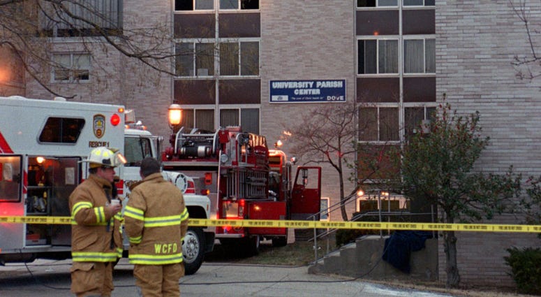 Front view of the North section of Boland Hall. Note the windows broken out on the 3rd floor. Seton Hall Dorm Fire