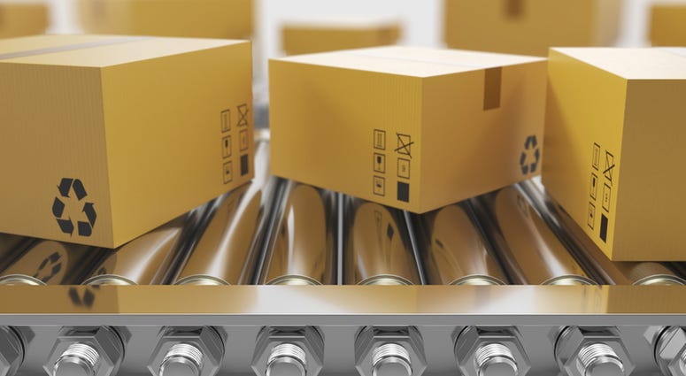 Recycled packaging on conveyor belt