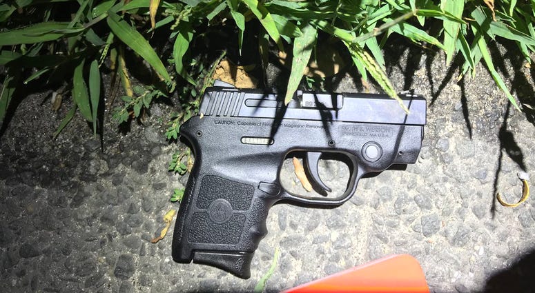 Gun recovered at the scene of the shooting. Teenagers gun