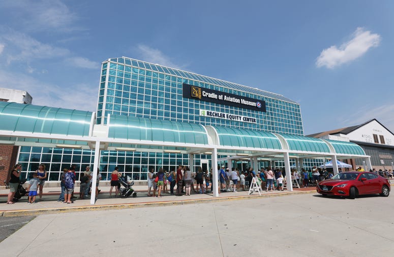 Spectators in line at the aviation museum. Spectators in line at the aviation museum.