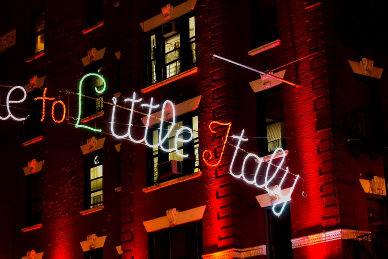 Neon sign hanging above Little Italy in Manhattan, New York. Little Italy sign