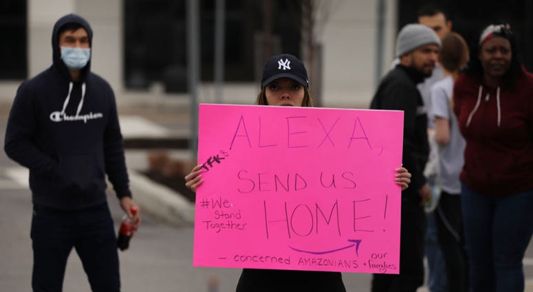 Amazon employees hold a protest and walkout over conditions at the company's Staten Island distribution facility on March 30, 2020 in New York City. Amazon Strike