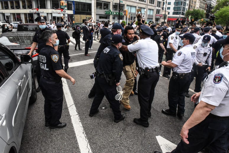 A protester is detained by police during a rally against the death of Minneapolis, Minnesota man George Floyd at the hands of police on May 28, 2020 in Union Square. George Floyd protest in Union Square