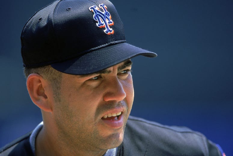 Edgardo Alfonzo #13 of the New York Mets looks on during the game against the Pittsburgh Pirates at Shea Stadium in Flushing. Edgardo Alfonzo