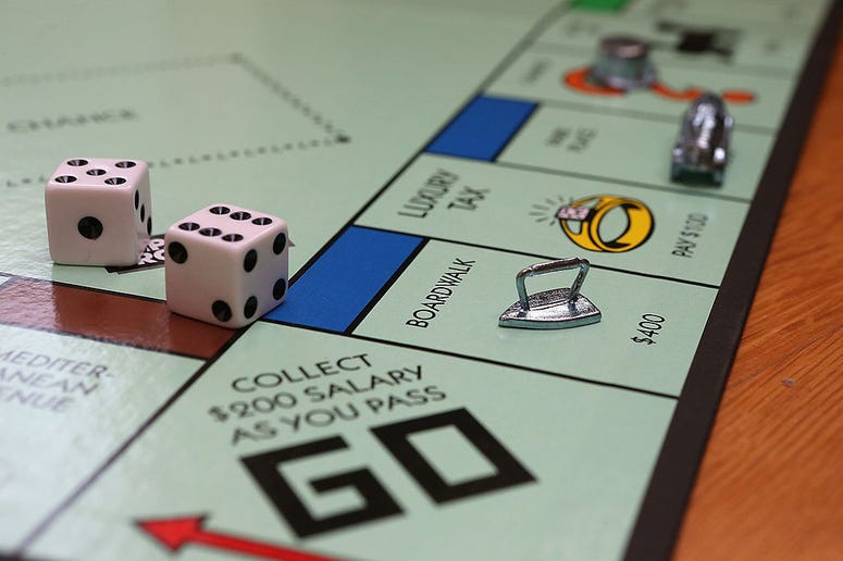 In this photo illustration, The Monopoly iron game piece is displayed on February 6, 2013 in Fairfax, California. Monopoly