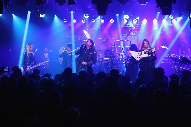 Chris Caffery, Roddy Chong, Joel Hoekstra and members of Trans-Siberian Orchestra perform onstage during an exclusive performance at The iHeartRadio Theater in New York at iHeartRadio Theater on November 17, 2014 in New York City. Trans-Siberian Orchestra