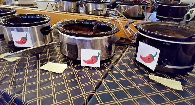 Row of crockpots for chili cook-off contest. Chili Cook-Off