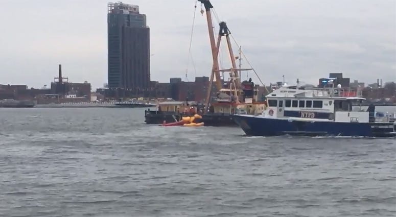 Helicopter pulled from East River after crash that killed five passengers. East River Helicopter Crash