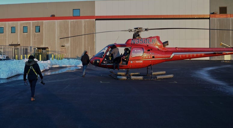 This helicopter crashed into New York City s East River around sundown and flipped on its side, killing at least two people. Three people are in critical condition. The U.S. Coast Guard said there were six people, including the pilot, on board the helicop East River Helicopter Crash