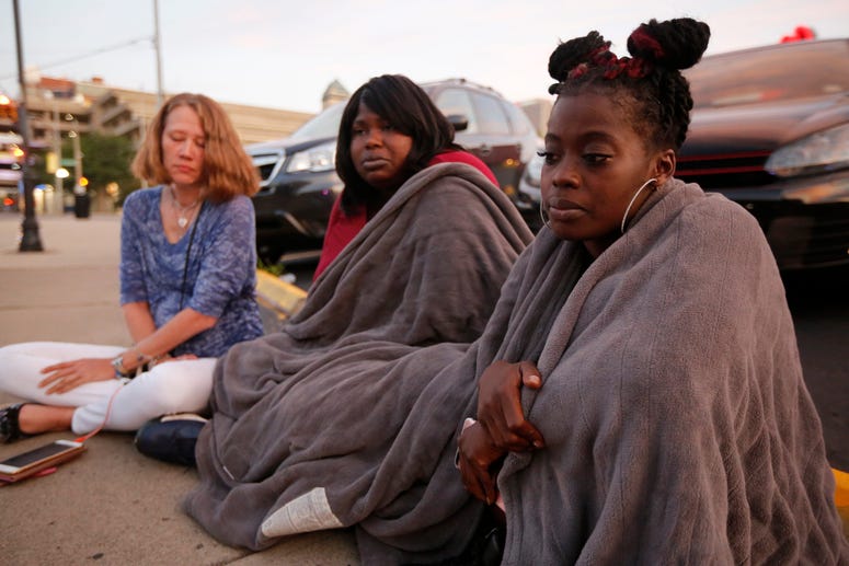 Witnesses Nikita Papillion, 23, of Five Oaks, Tanycia Leonard, 28, of Kettering, and Tiffany McConnell, 43, of Vandalia, recall their night out in the Oregon District before gunfire broke out in Dayton, Ohio, on Sunday, Aug. 4, 2019. Dayton shooting