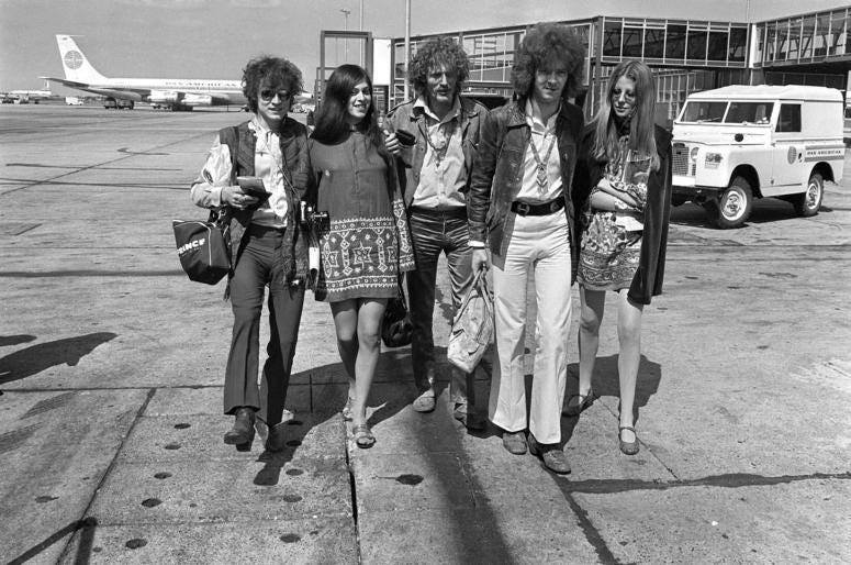 In this Aug. 20, 1967 file photo, members of the rock group Cream depart from Heathrow Airport in London, for their American tour. Ginger Baker