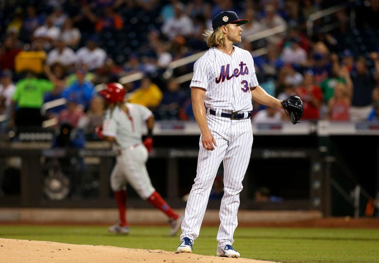Noah Syndergaard #34 of the New York Mets stands on the mound after surrendering a second inning home run against Maikel Franco #7 of the Philadelphia Phillies at Citi Field on July 06, 2019 in New York City. Mets vs Phillies