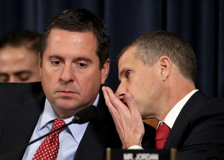 Rep. Devin Nunes, left, and Steve Castor speak before the House Intelligence Committee in the Longworth House Office Building on Capitol Hill November 13, 2019 in Washington, DC. Rep. Devin Nunes