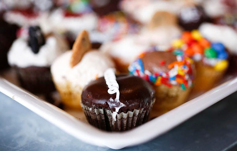 A selection of cupcakes is seen at Crumbs Bake Shop & David Burke NYC event to launch lunch menu at David Burke Treehouse Bar on June 6, 2013 in New York City. Cupcakes