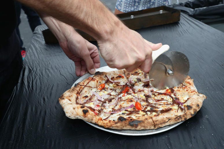 Pizza from Skinny Pines, LLC on display the Food Network & Cooking Channel New York City Wine & Food Festival Presented By Coca-Cola - Coca-Cola Backyard BBQ presented by National Beef at Pier 92 Rooftop on Oct. 15, 2017 Pizza Festival