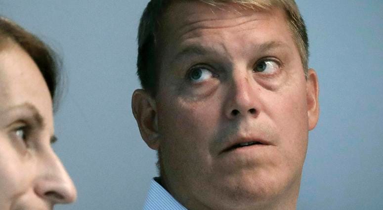 In this Aug. 20, 2019 file photo, Scott Hapgood, right, a U.S. financial adviser charged with killing a hotel worker while on vacation in Anguilla, and his lawyer Juliya Arbisman, left, hold a media conference in New York. Scott Hapgood