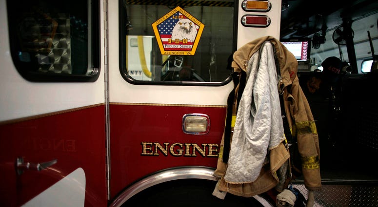 The 9/11 logo on one of the fire engines of the Arlington County Fire Department in Arlington, Virginia 9/11 cancer
