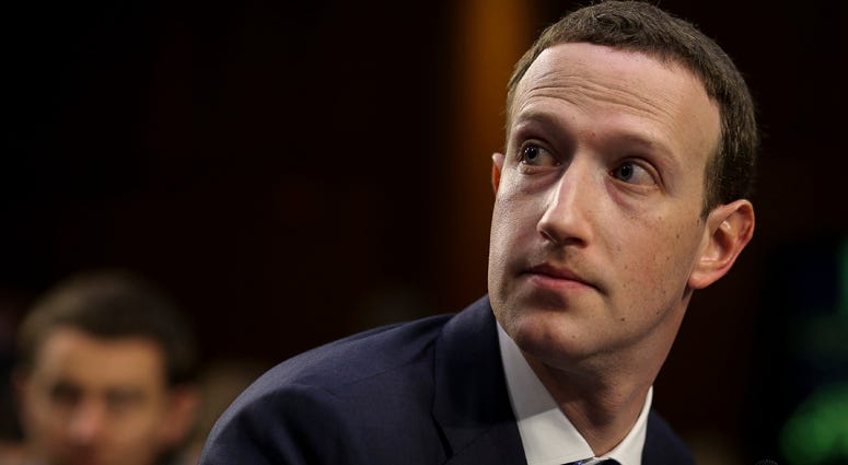 Facebook CEO Mark Zuckerberg testifies before a joint hearing of the Commerce and Judiciary Committees on Capitol Hill in Washington, DC, on April 10, 2018, Mark Zuckerberg