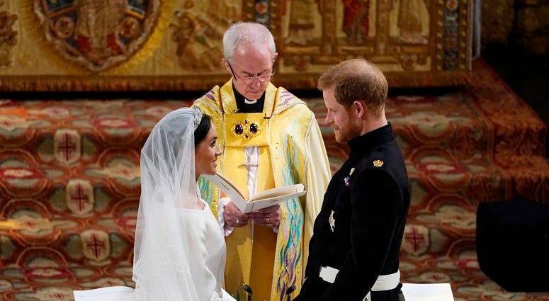 Prince Harry and Meghan Markle exchange vows in St George's Chapel at Windsor Castle during their wedding service, conducted by the Archbishop of Canterbury Justin Welby. The Royal Wedding