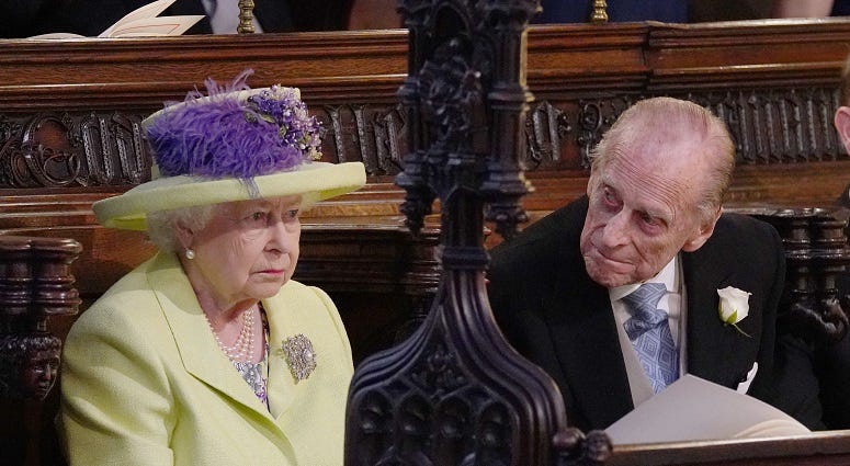 Queen Elizabeth II and Prince Phillip during the wedding service for Prince Harry and Meghan Markle at St George's Chapel, Windsor Castle. The Royal Wedding