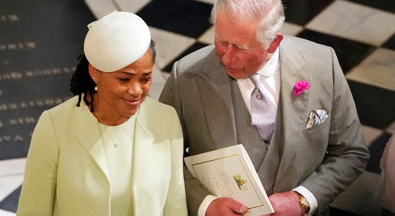 The Prince of Wales and Doria Ragland, mother of the bride, depart from St George's Chapel in Windsor Castle after the wedding of Prince Harry and Meghan Markle. The Royal Wedding