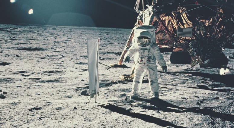 Solar Wind Experiment Edwin 'Buzz' Aldrin standing next to the Solar Wind Composition experiment