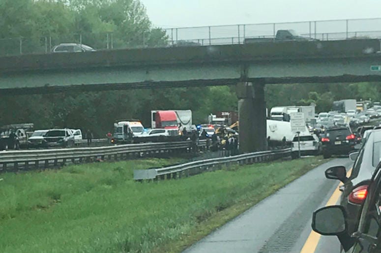 Emergency personnel respond to a crash after a school bus and dump truck collided in Mount Olive, N.J., Thursday, May 17, 2018. Deadly New Jersey School Bus Crash