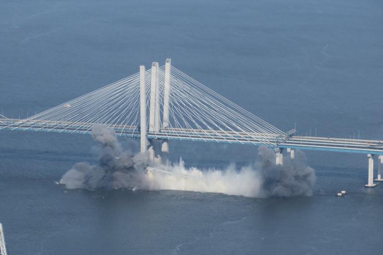 The bridge goes down in smoke. Tappan Zee Bridge
