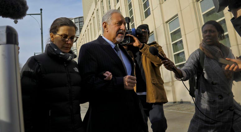 Clare Bronfman, left, a member of NXIVM, an organization charged with sex trafficking, leaves Brooklyn Federal Court with her lawyer Mark Geragos after she received medical attention while in court, Wednesday March 27, 2019, in New York. Clare Bronfman