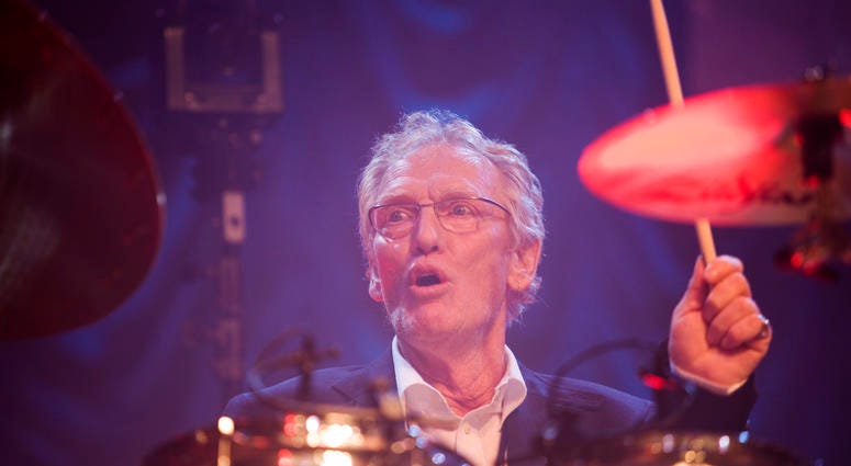 In this Sunday, Dec. 7, 2008 file photo, British musician Ginger Baker performs at the 'Zildjian Drummers Achievement Awards' at the Shepherd's Bush Empire in London. Ginger Baker