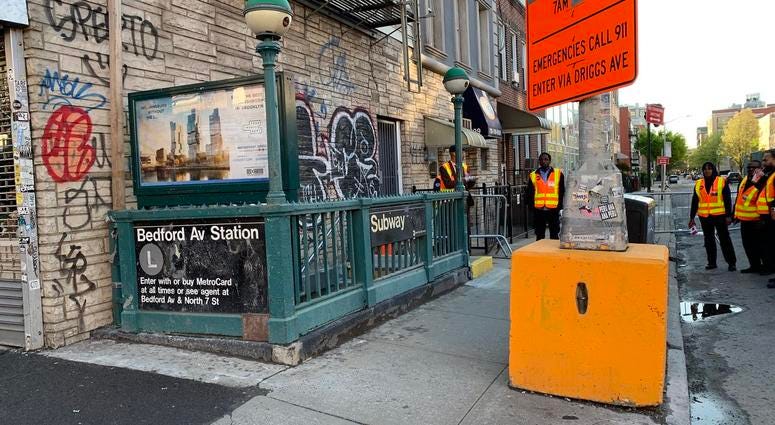 MTA workers at the Bedford Avenue station in Williamsburg. L train Bedford Avenue